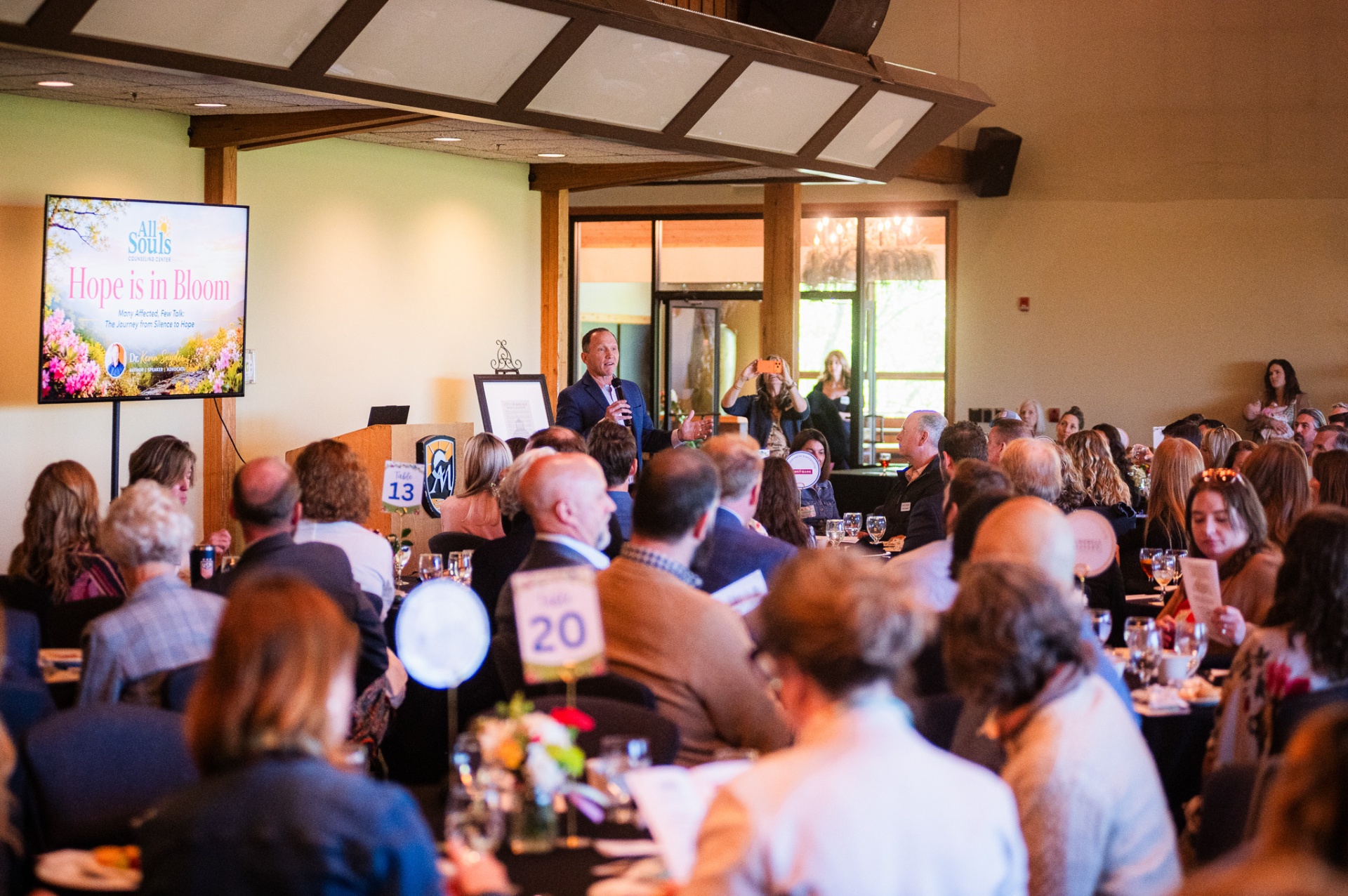 Dr. Kevin C. Snyder delivering the Think Differently keynote to a seated audience