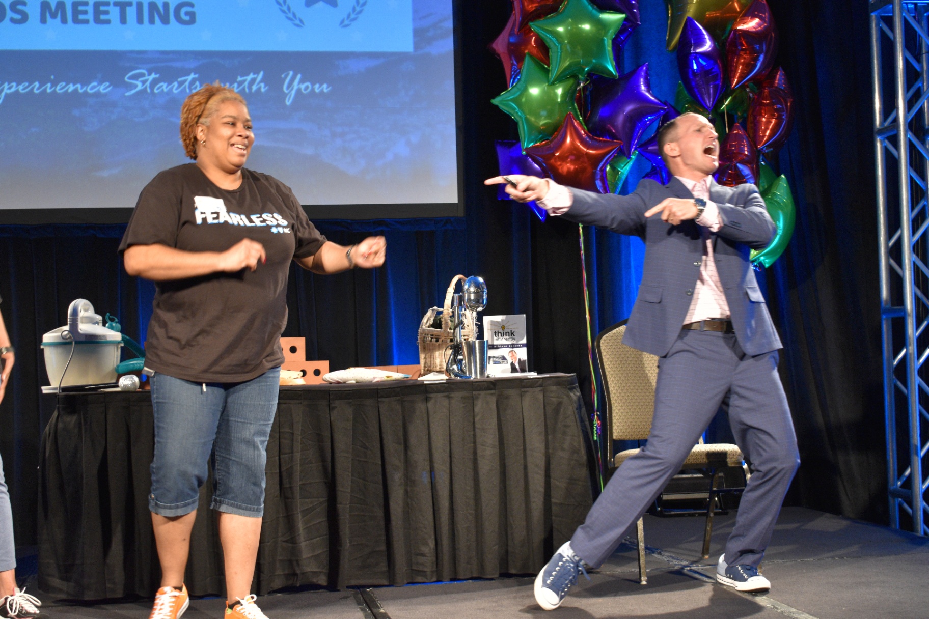 Kevin interacting with an audience member on stage